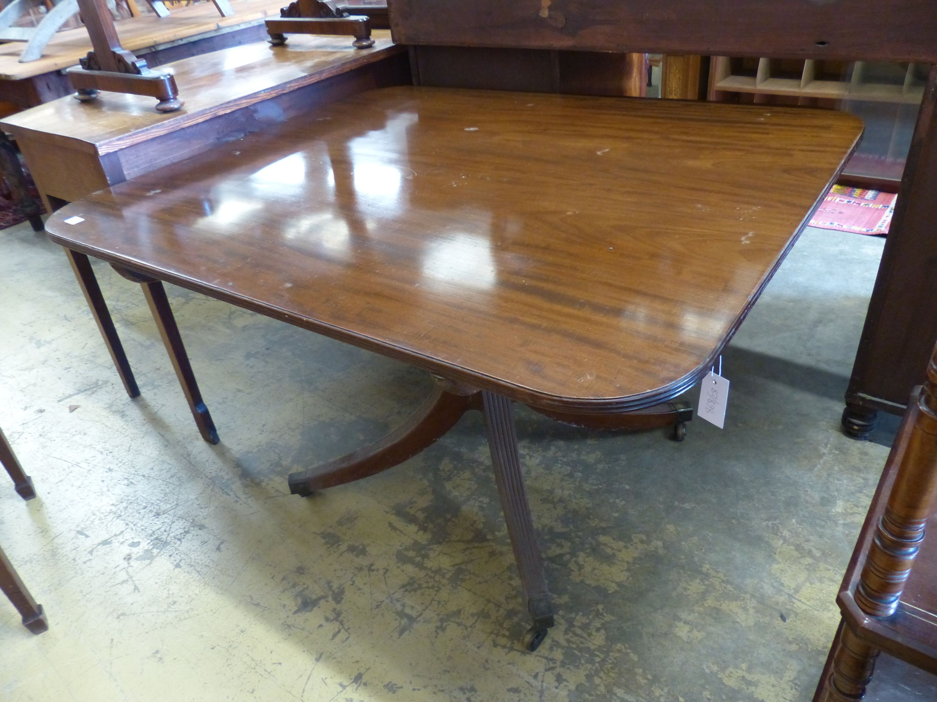 A George III design rectangular mahogany tilt top breakfast table, length 118cm, width 100cm, height 70cm